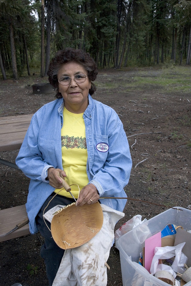 Native American woman working on crafts at Tetlin National Wildlife Refuge