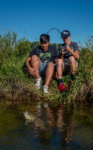 Two boys fishing for small mouth bass-2