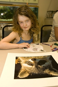 Child uses hands-on learning tools-1