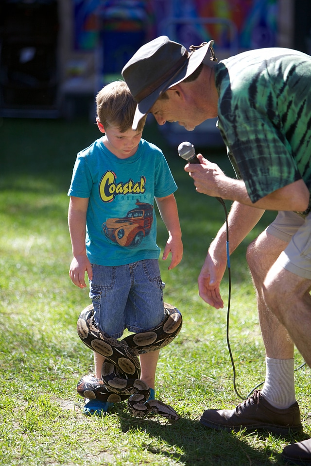 Reptile educator with child