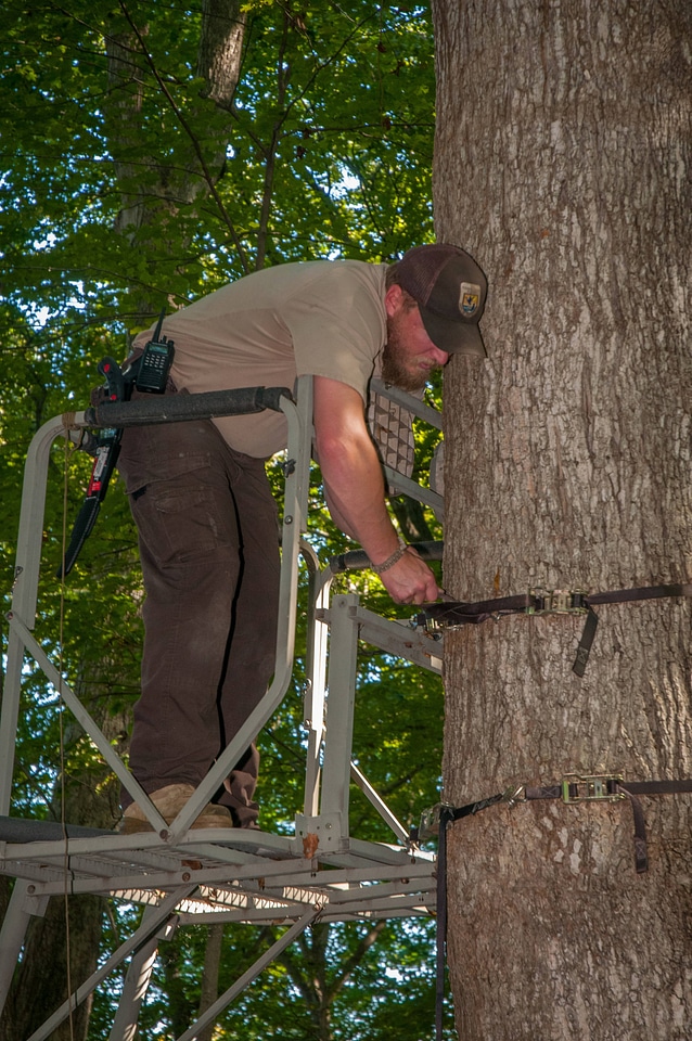NCTC land management specialist inspecting deer stand for safety-5