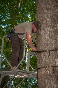 NCTC land management specialist inspecting deer stand for safety-5