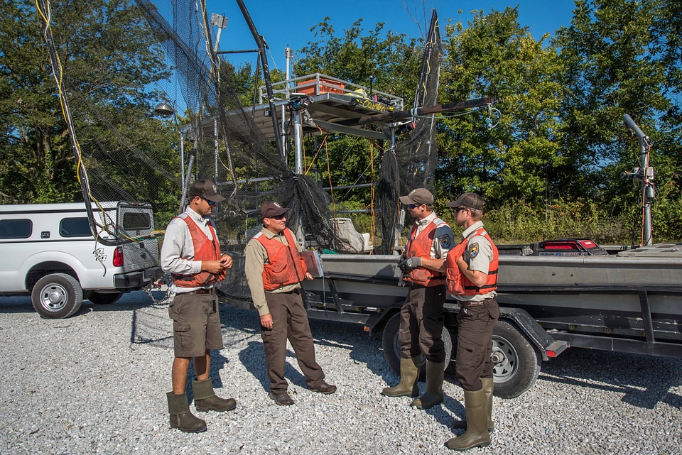 Crew of the U.S. Fish and Wildlife Service boat, The Magna Carpa, safety briefing-4