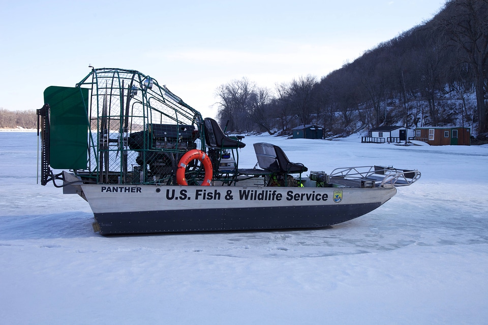 Service airboat sits on ice