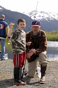 Man and boy with fishing pole at Portage photo