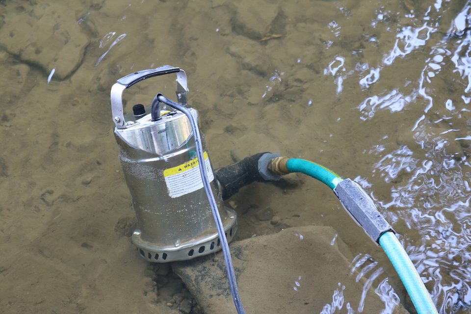 Small submersible pump used to pump river water to the mussel holding tank