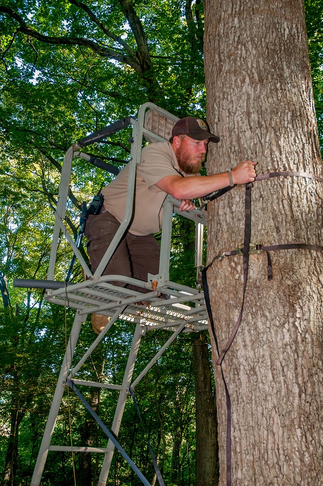NCTC land management specialist inspecting deer stand for safety-3