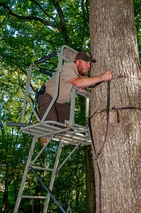 NCTC land management specialist inspecting deer stand for safety-3