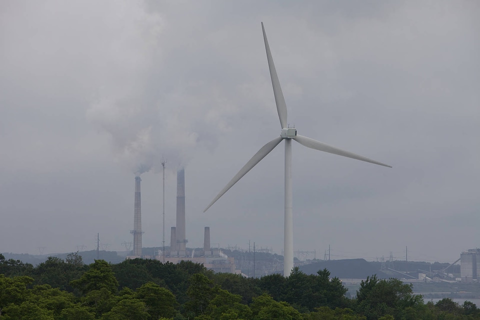 Wind energy turbine and coal power smoke stacks