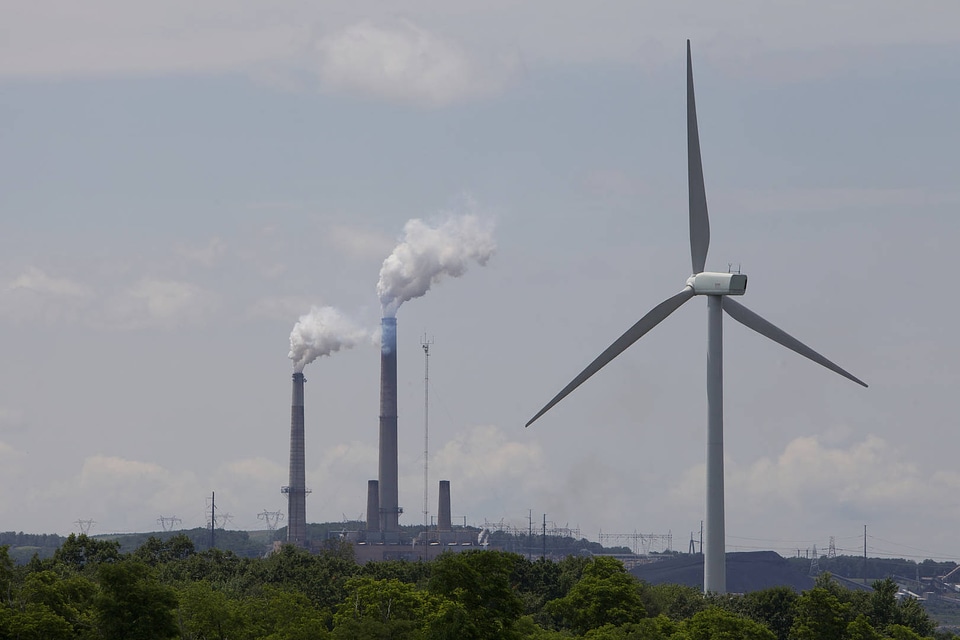Wind energy turbine and coal power smoke stacks-2