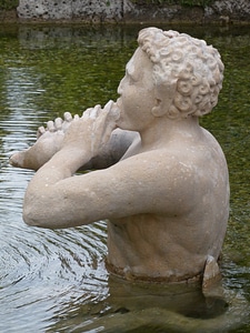 Human statue pond