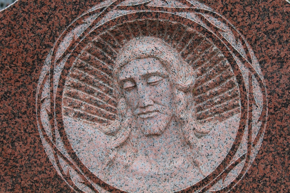 Cemetery tombstone funerary art