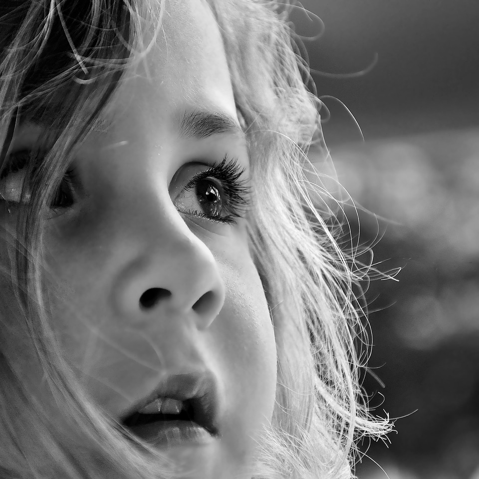 The little girl portrait in black and white eyes