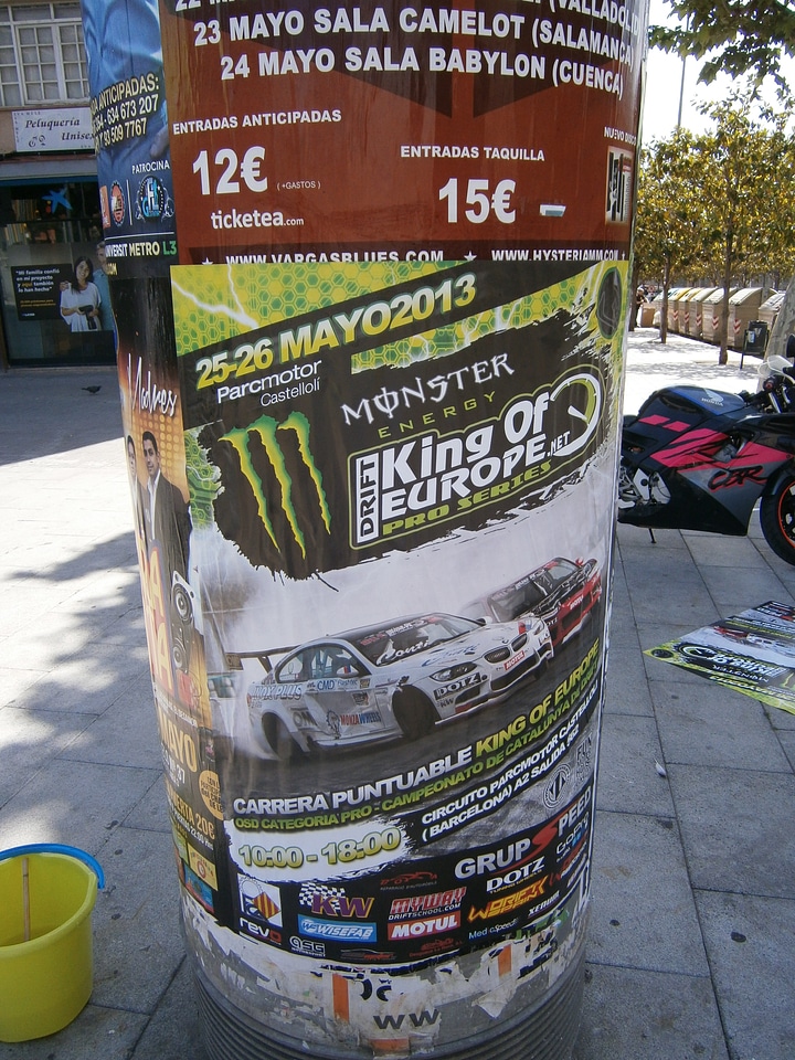 Posters pasted on posters posters stuck on the street advertising flags