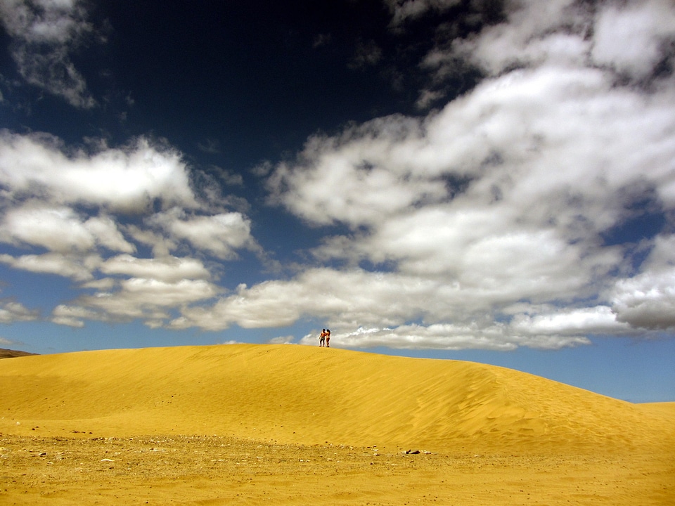 Sand sky clouds