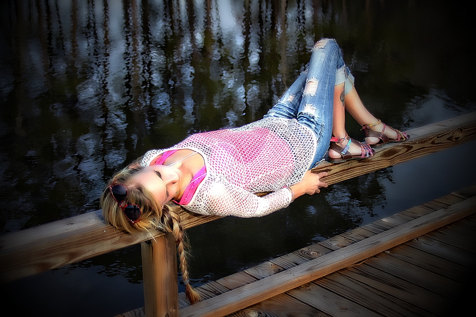 Laying down outdoors young