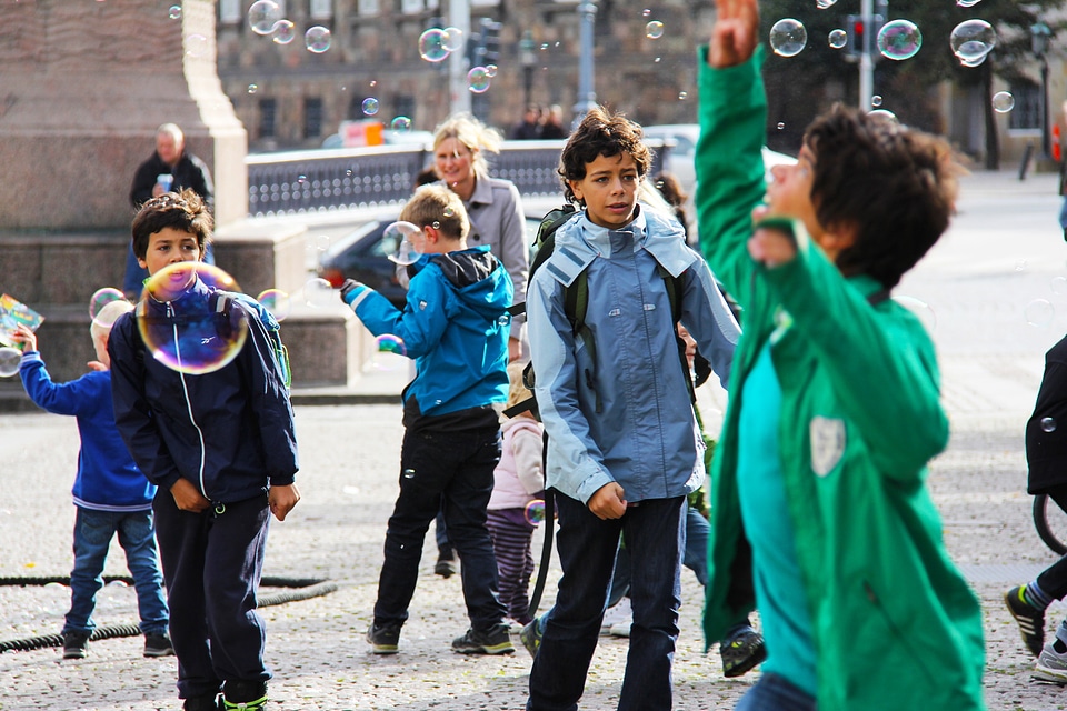 Children playing bubbles