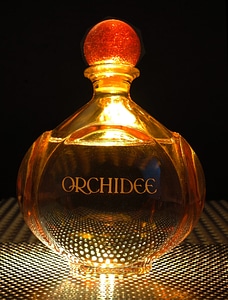 Perfume bottle light from below photo