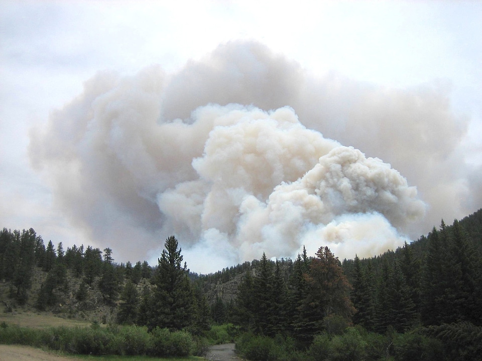 Mountains trees smoke