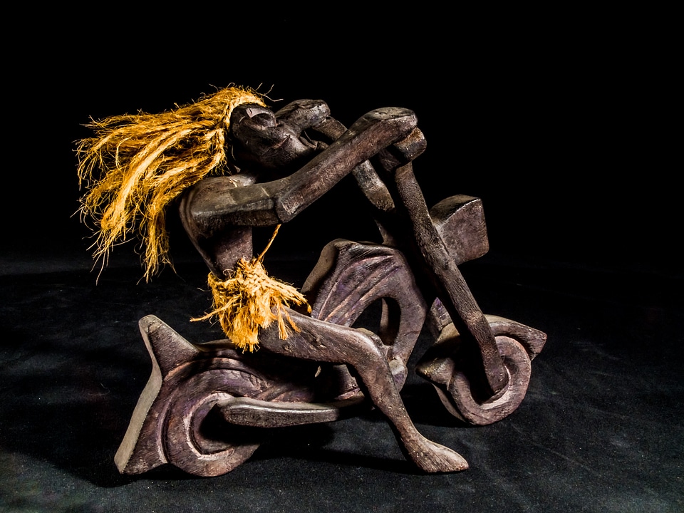 Wild hairstyle wood model art from thailand