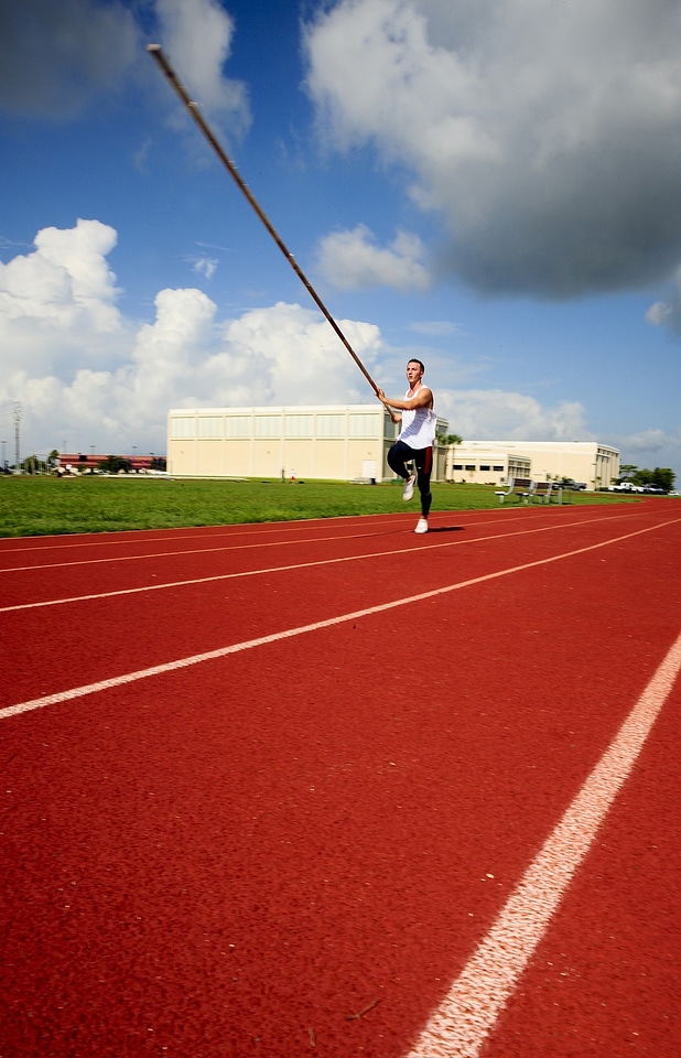 Man vaulting athlete