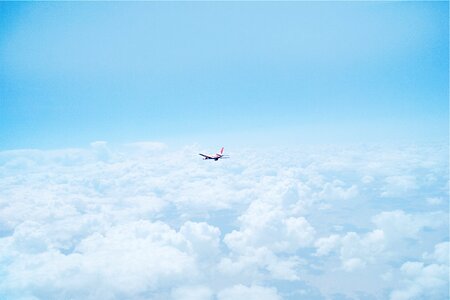 Airplane Above The Clouds photo