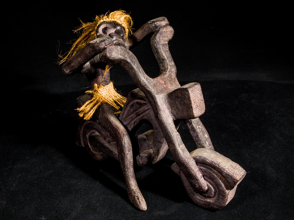 Wild hairstyle wood model art from thailand