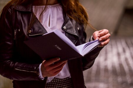 Woman is reading a book photo