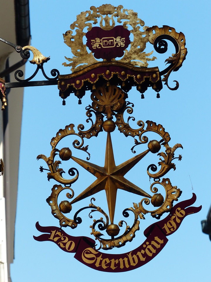 Advertising sign wrought ironwork inn