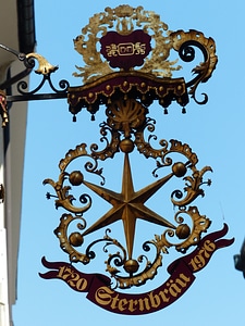 Advertising sign wrought ironwork inn photo