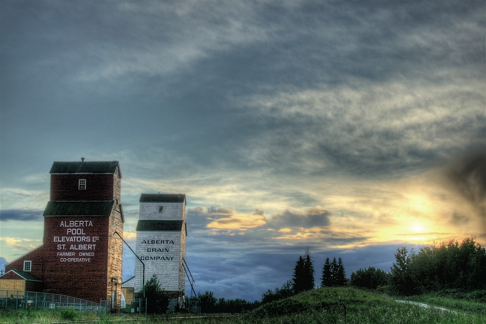 Clouds buildings grain elevators