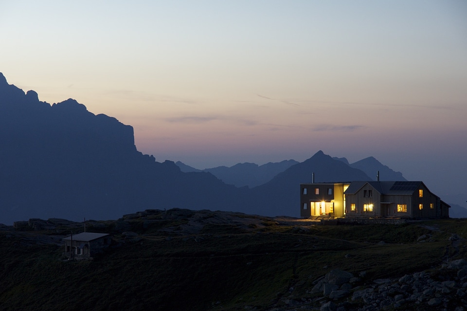 Lighting hut evening mountain hut