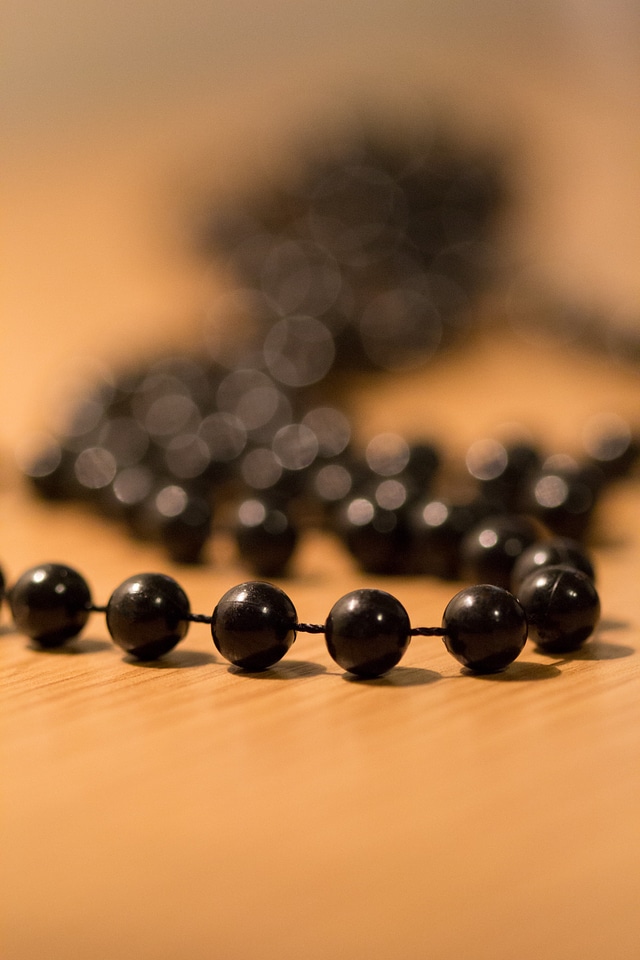 Black plastic beads fuzzy