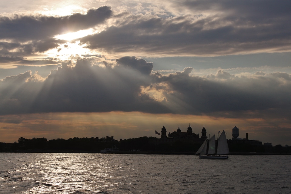 Sunset sailboat reflections