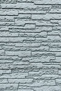 Grey Painted Brick Wall with Uneven Grid Pattern