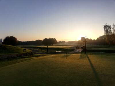 Sunrise at golf course photo
