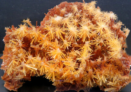 orange crystalline mineral photo