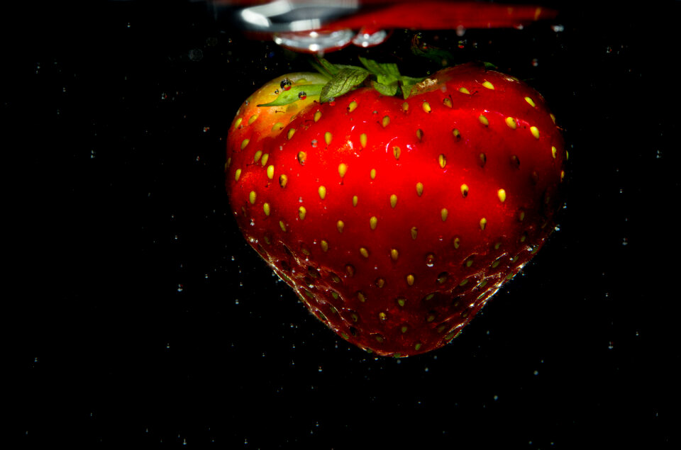 Strawberry on a black backdrop