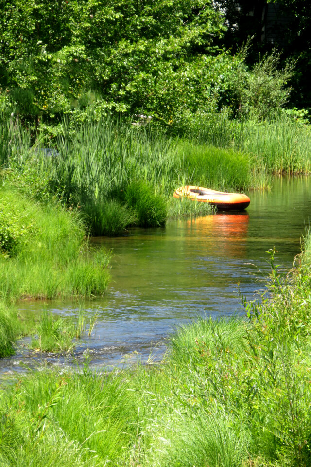 stream with rubber boat