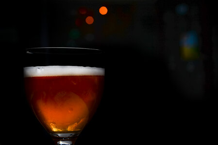 Glass of beer in the dark