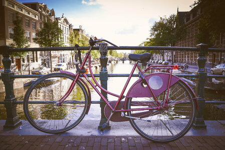Parked bike at a canal photo