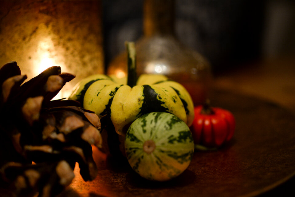 Pumpkins and a candle