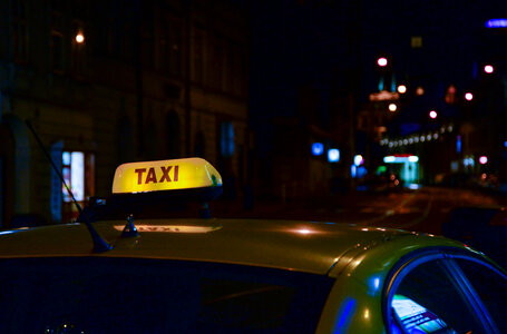Taxi waiting at night photo