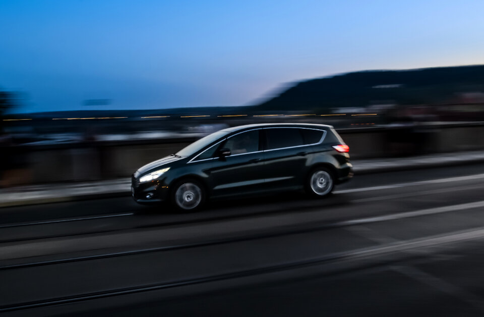 Car panning street