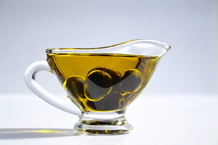 olive oil in a gravy boat photo
