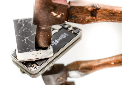 Smashing a phone with a hammer