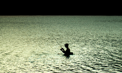 Fishing in lake photo