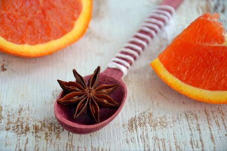 Star anise on a wooden spoon photo
