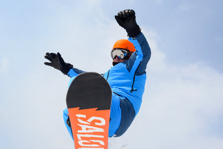 Snowboarder jump photo