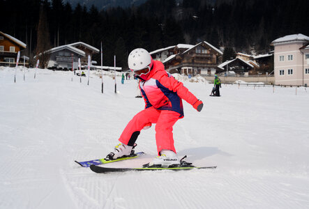 Girl learning to ski photo